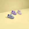 Three pairs of children's sports shoes are available in grey, purple and pink Specification image